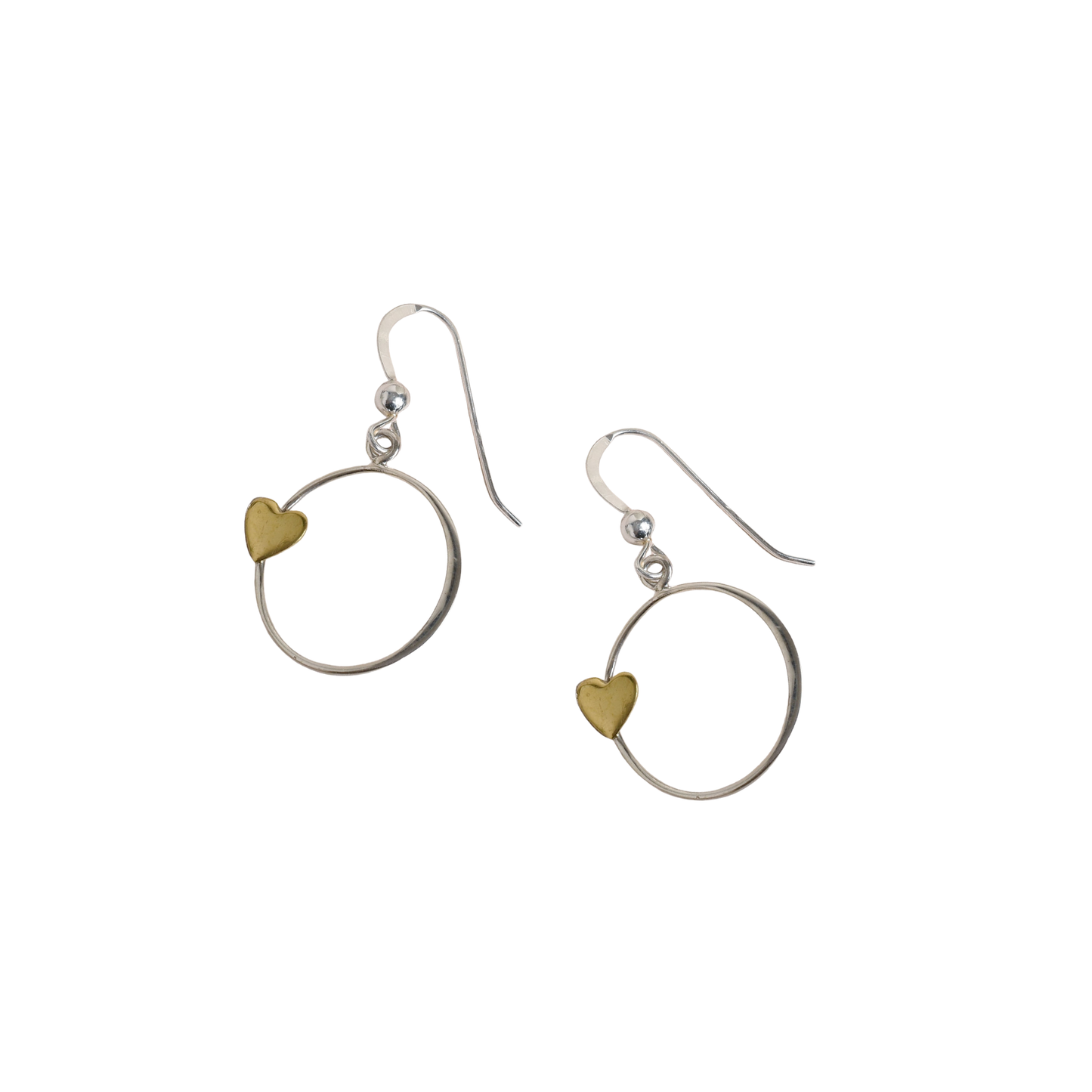 Pair of earrings with bronze heart charms on white background