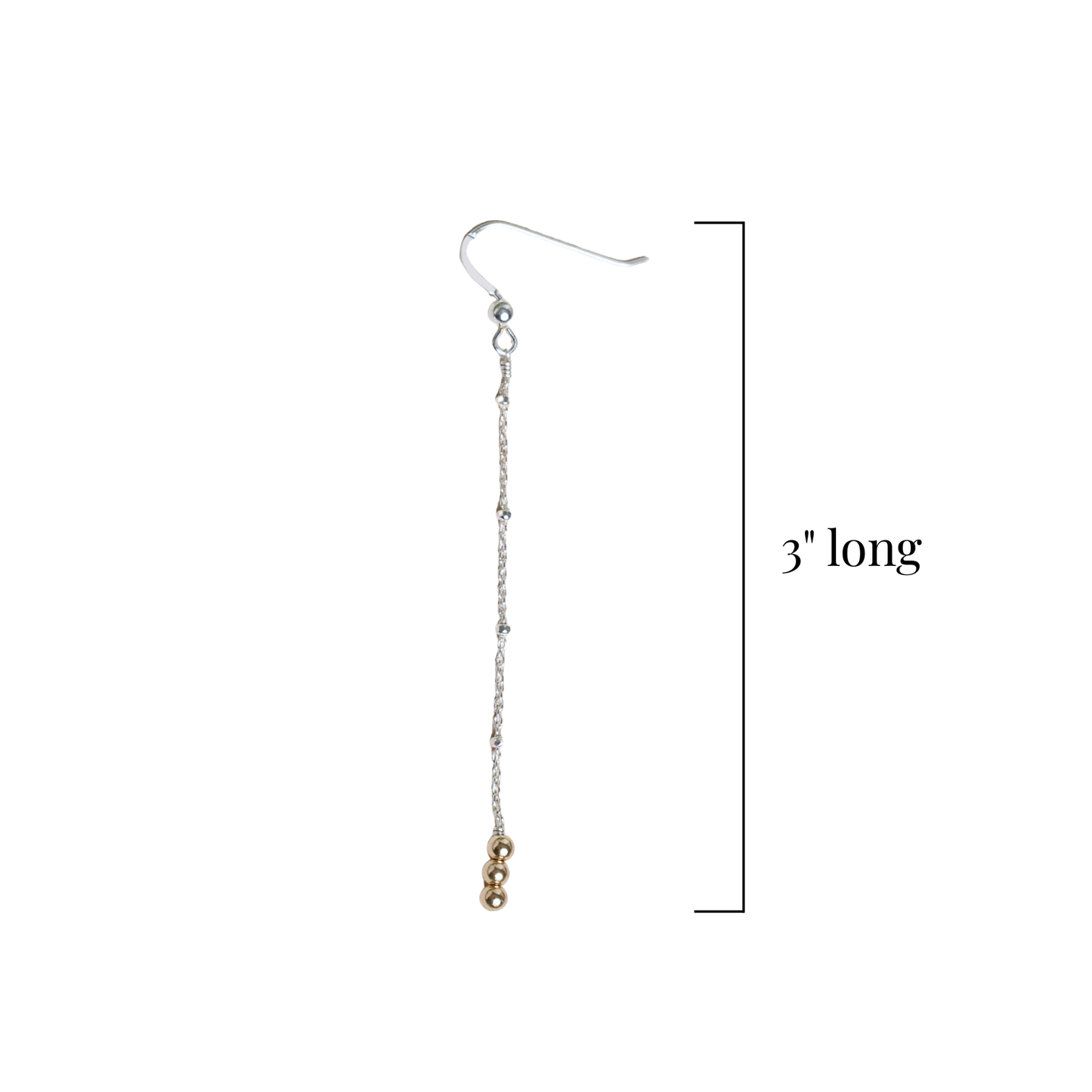 Silver chain earring with small round gold beads on a white background