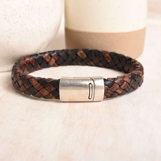 Braided leather in a black and brown mix with a silver magnetic clasp.