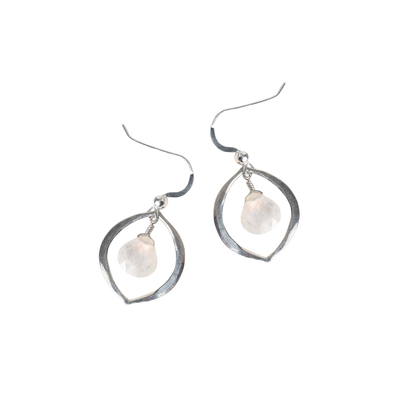 Silver earrings with moonstone on a white background