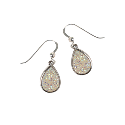 Teardrop-shaped earrings with glittery finish on a white background