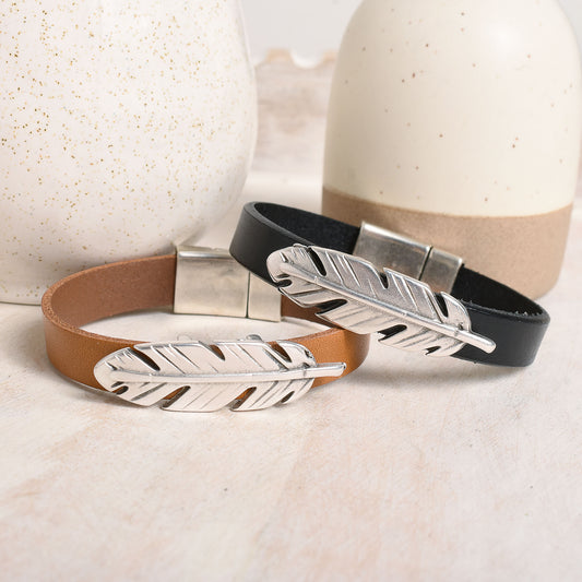 choose between black and tan leather with a feather accent.