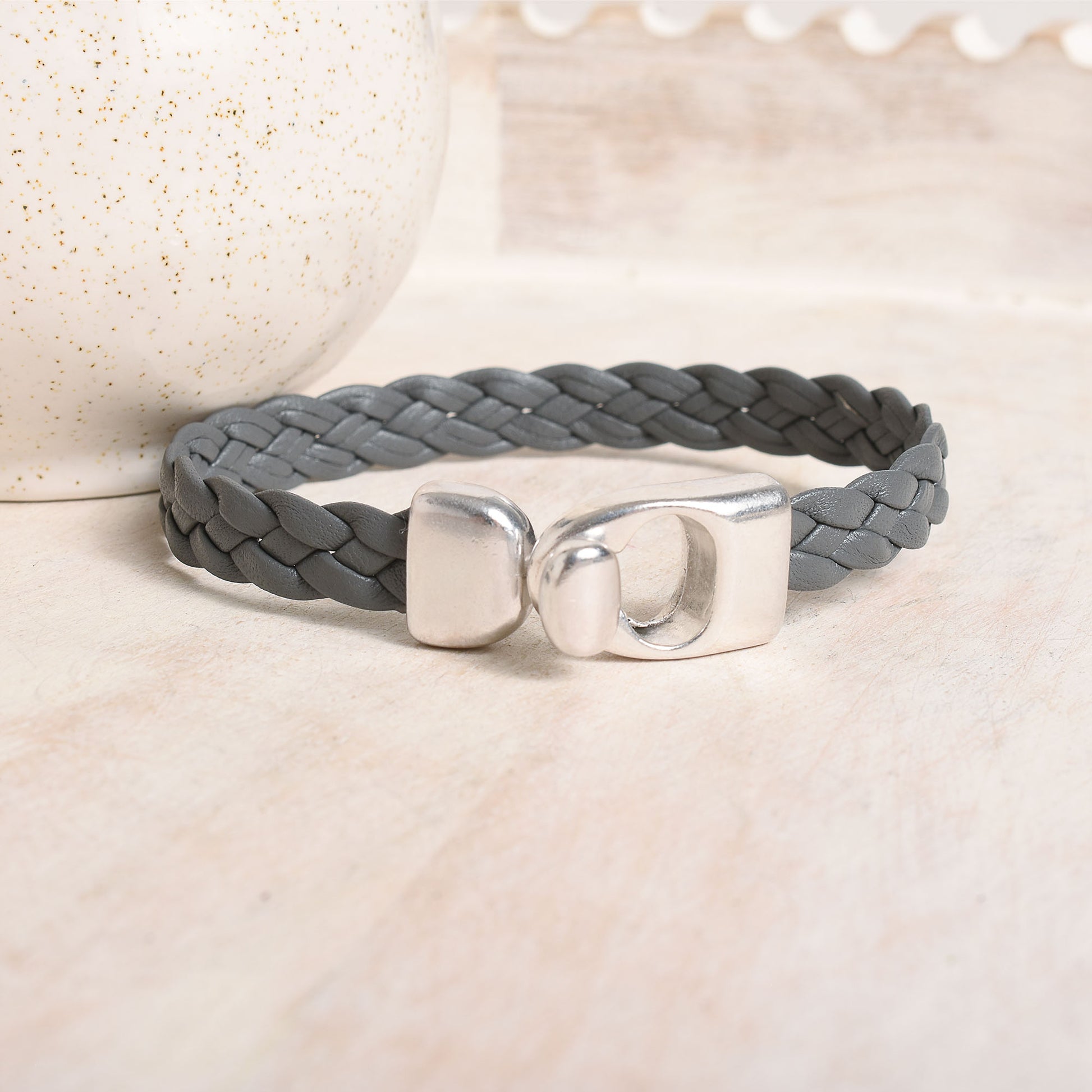 Slate grey leather braided bracelet with metal clasp