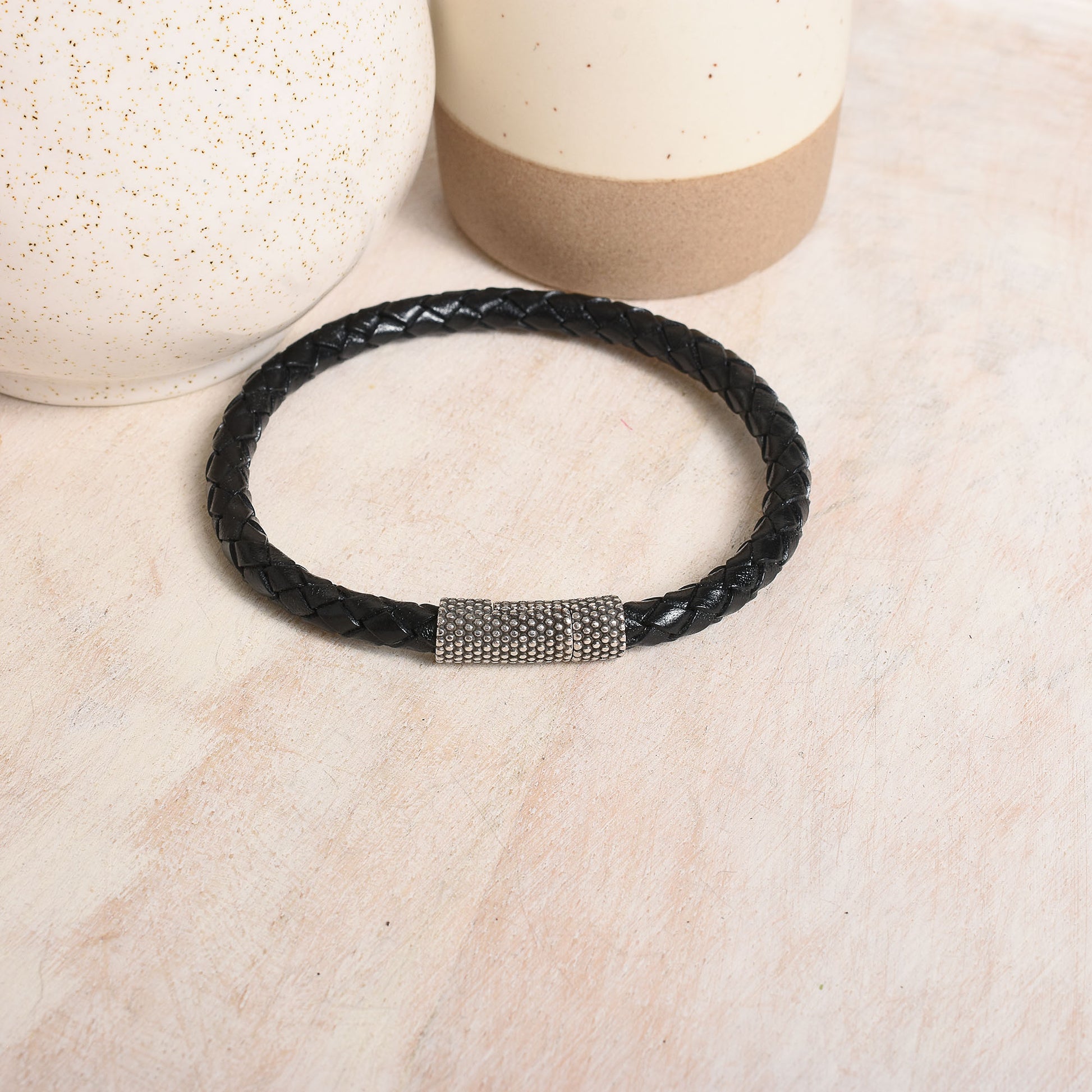 Simple black leather bracelet with easy to use antiqued magnetic clasp.