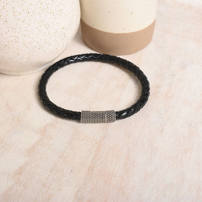 Simple black leather bracelet with easy to use antiqued magnetic clasp.