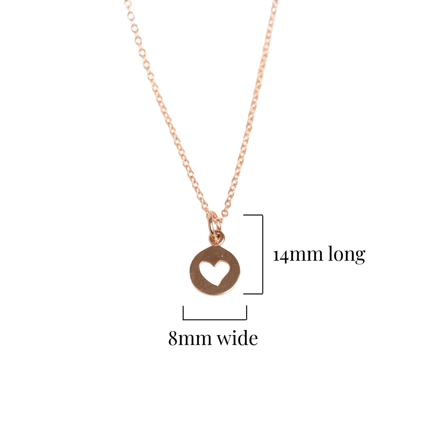 Rose gold necklace with heart pendant on a white background and its measurements 