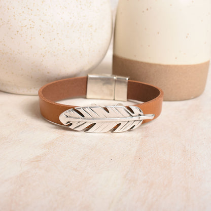 Tan leather with silver feather accent