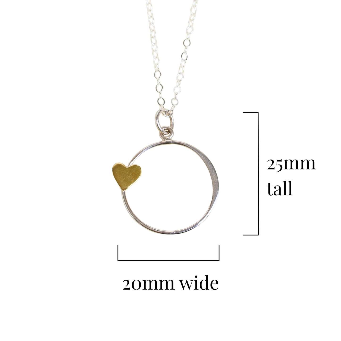 Silver necklace with a bronze heart pendant on a white background