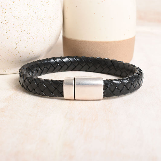 Minimalist bracelet featuring a leather woven band 