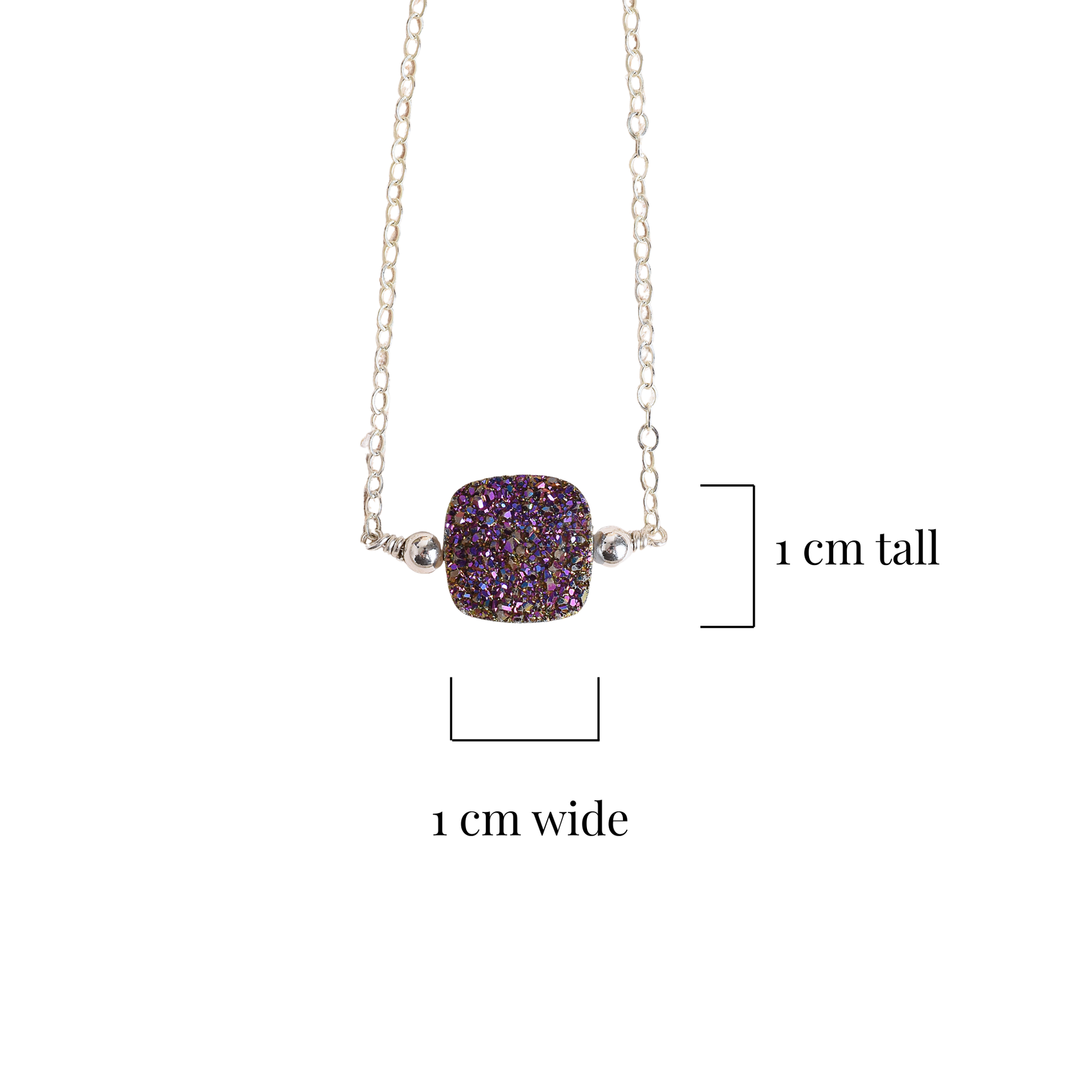 Necklace with a purple druzy pendant on a white background