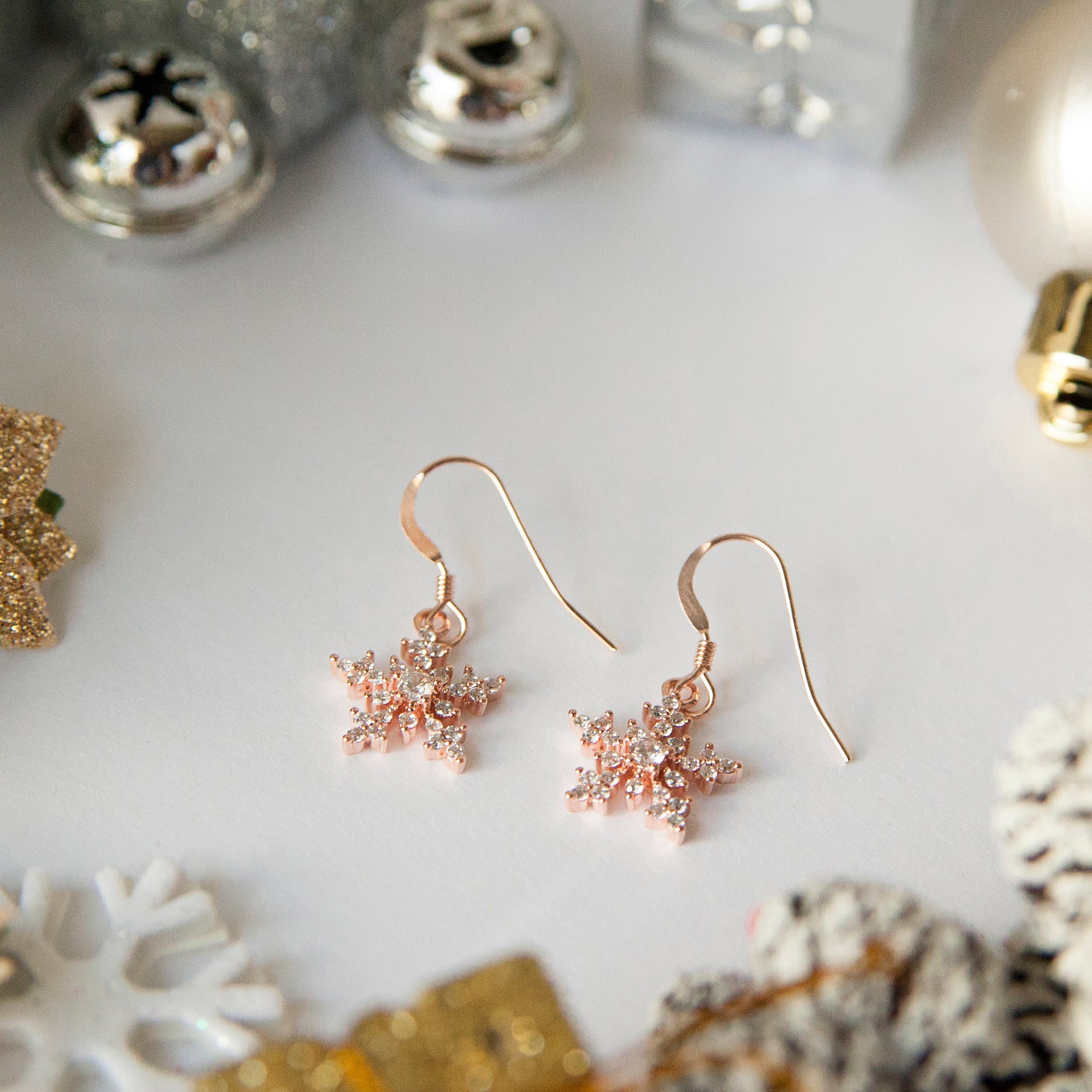 Snowflake Earrings in Rose Gold