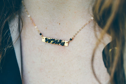Model Wearing Wire Wrapped Black Spinel Gold Necklace 